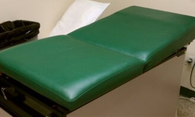 green medical chair reupholstered